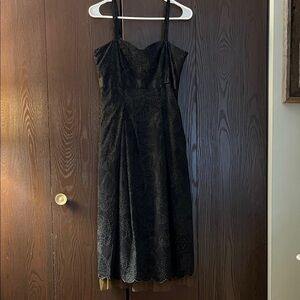 Didi strapped black eyelet dress lined in brown with netted bottom. XS
